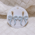 Polymer Clay Ribbon Bow Dangle Earrings – Soft Blue & Sand