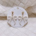 Polymer Clay Ribbon Bow Dangle Earrings – Soft Blue & Sand